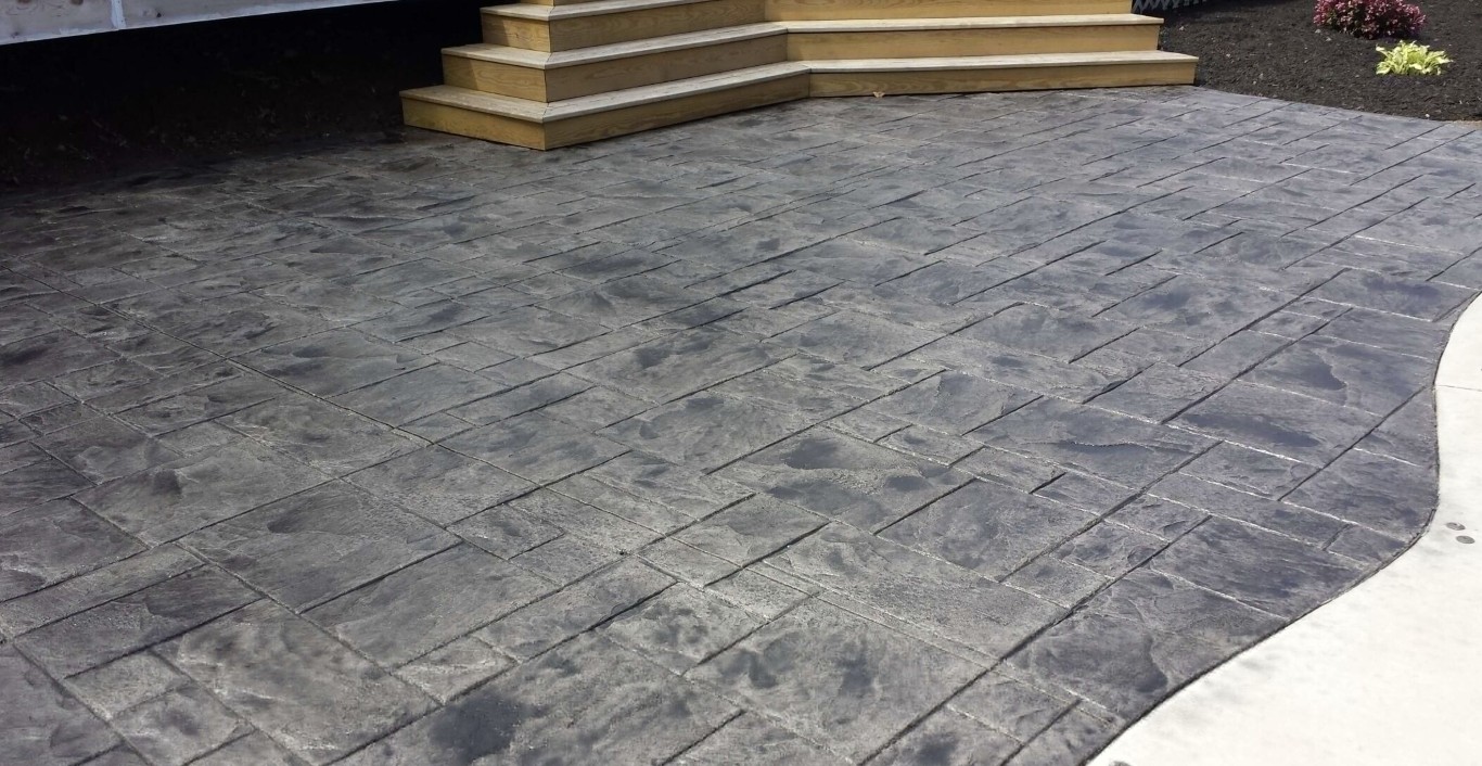 Stamped concrete patio with wood plank pattern texture